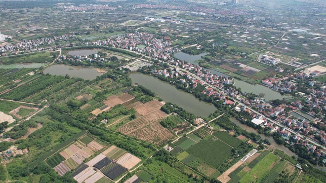 Đất đấu giá một huyện tại Hà Nội cao gấp 10 lần giá khởi điểm, thu ngân sách cả trăm tỷ chỉ sau vài tiếng- Ảnh 1.