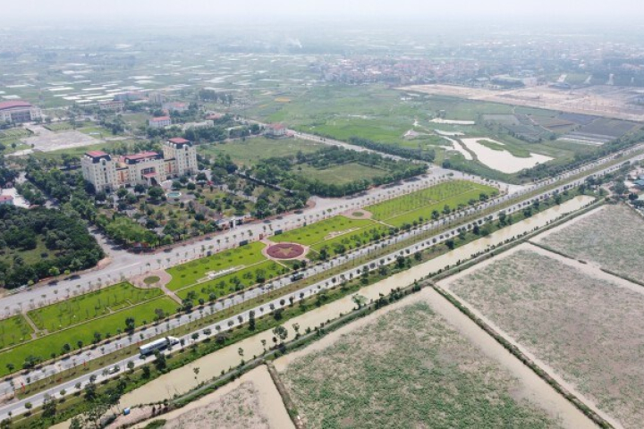 Hà Nội điều chỉnh nội dung giao đất cho dự án nhà ở sinh thái ven sông tại Mê Linh- Ảnh 1.