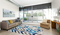 Làm đẹp nội thất phòng khách bằng thảm trang trí