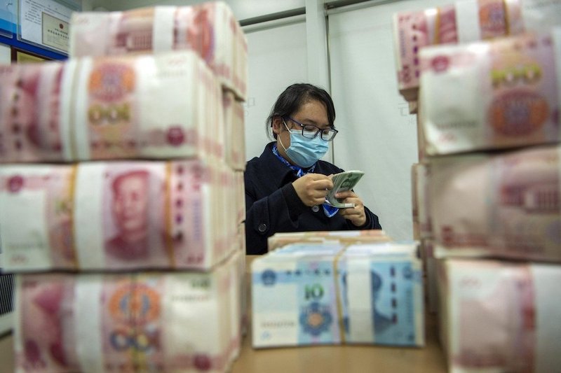 Trung Quốc kiềm chế mức tăng mạnh của đồng Nhân dân tệ so với Đô la Mỹ