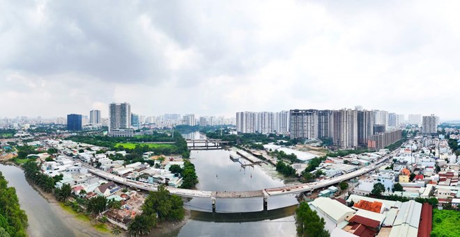 Hai cây cầu huyết mạch nối Quận 7 và Nhà Bè sắp thông xe- Ảnh 1. Hai cây cầu huyết mạch nối Quận 7 và Nhà Bè sắp thông xe- Ảnh 1.