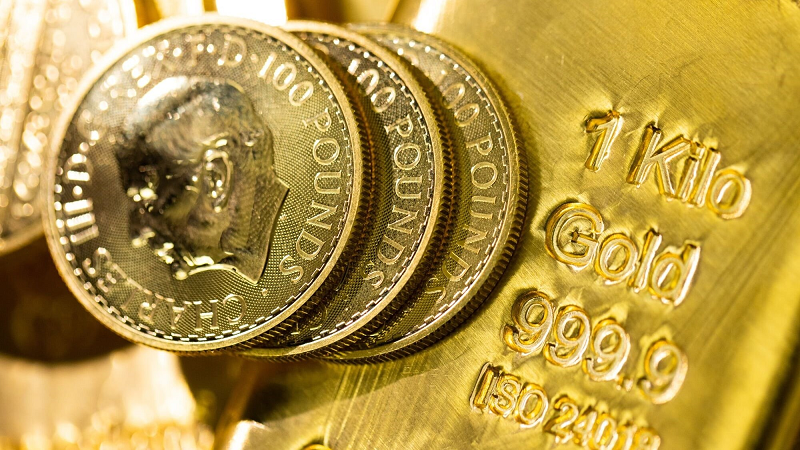 Giá vàng hạ nhiệt sau đà tăng mạnh, nhà đầu tư thận trọng quan sát kinh tế Mỹ- Ảnh 1.