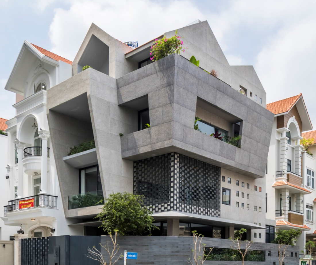 Nhà bê tông nghiêng mái đỏ thiết kế linh hoạt cho ở và kinh doanh tại TP.HCM- Ảnh 2.