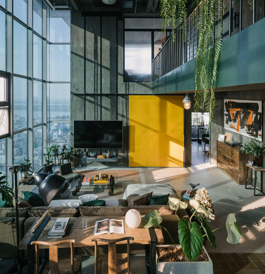 Cải tạo căn hộ thông tầng Hà Nội: Giải pháp Industrial thuần hóa sức nóng hướng Tây- Ảnh 1.