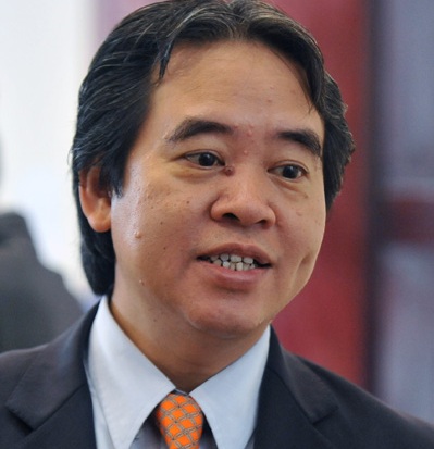 Thống đốc Nguyễn Văn Bình cho rằng một mình ngân hàng không thể giải quyết nợ xấu. Ảnh: Hoàng Hà